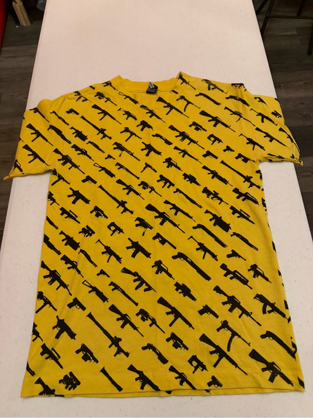 Men's Rogue Status RARE Yellow Short-Sleeve Graphic Tee with Black Gun Show